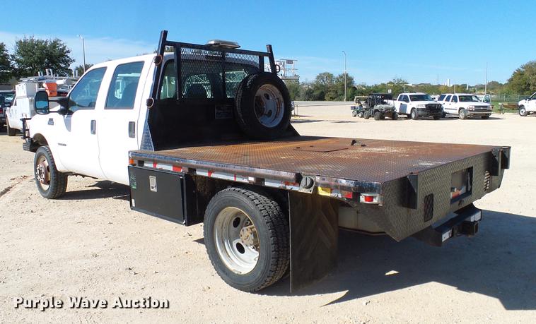 image for item DC2219 2002 Ford F450 Super Duty Crew Cab flatbed truck