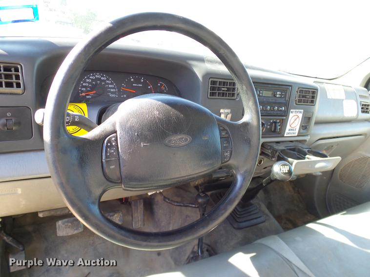 image for item DC2219 2002 Ford F450 Super Duty Crew Cab flatbed truck