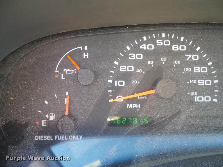 image for item DC2219 2002 Ford F450 Super Duty Crew Cab flatbed truck