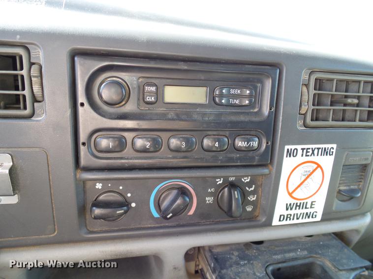 image for item DC2219 2002 Ford F450 Super Duty Crew Cab flatbed truck