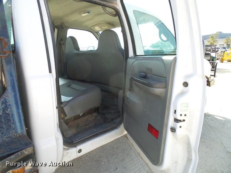 image for item DC2219 2002 Ford F450 Super Duty Crew Cab flatbed truck