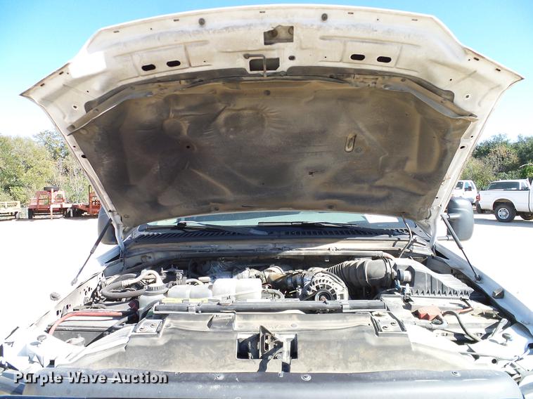 image for item DC2219 2002 Ford F450 Super Duty Crew Cab flatbed truck