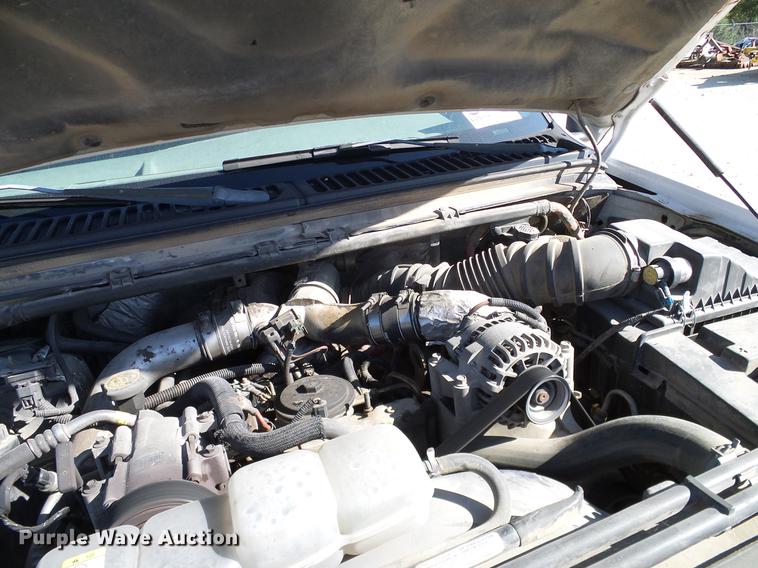 image for item DC2219 2002 Ford F450 Super Duty Crew Cab flatbed truck