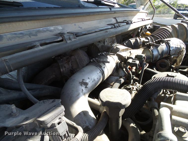 image for item DC2219 2002 Ford F450 Super Duty Crew Cab flatbed truck