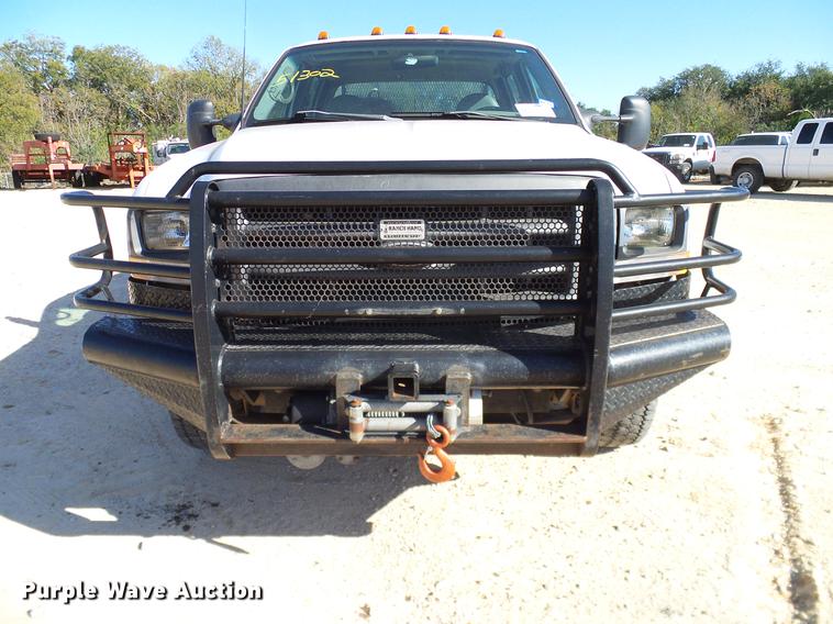 image for item DC2219 2002 Ford F450 Super Duty Crew Cab flatbed truck