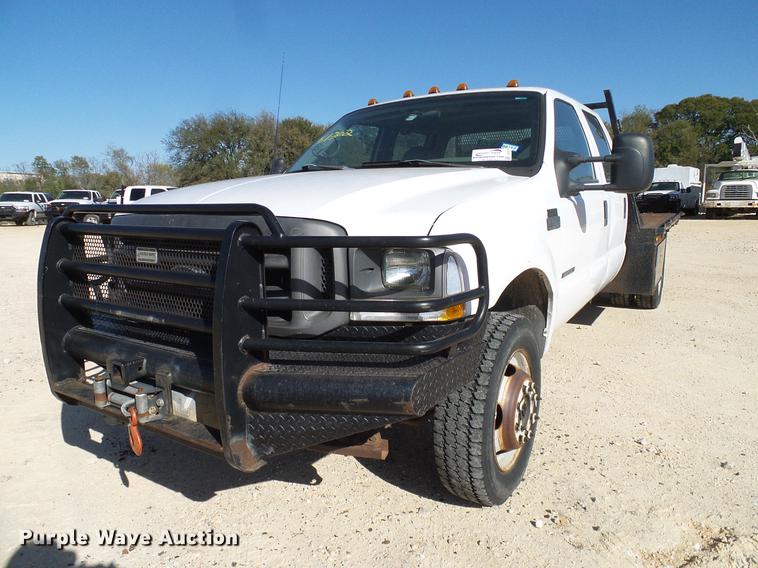 image for item DC2219 2002 Ford F450 Super Duty Crew Cab flatbed truck