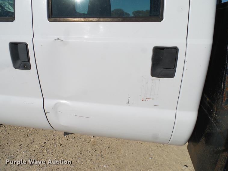 image for item DC2219 2002 Ford F450 Super Duty Crew Cab flatbed truck