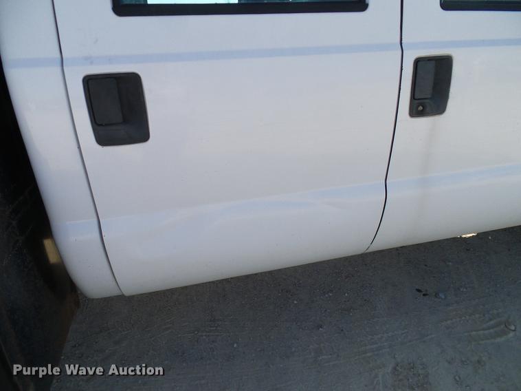 image for item DC2219 2002 Ford F450 Super Duty Crew Cab flatbed truck