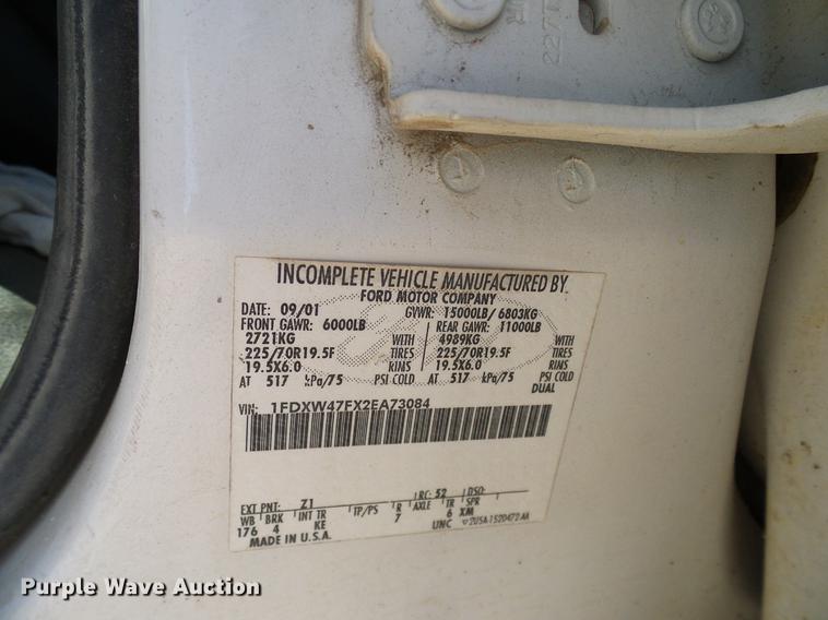 image for item DC2219 2002 Ford F450 Super Duty Crew Cab flatbed truck