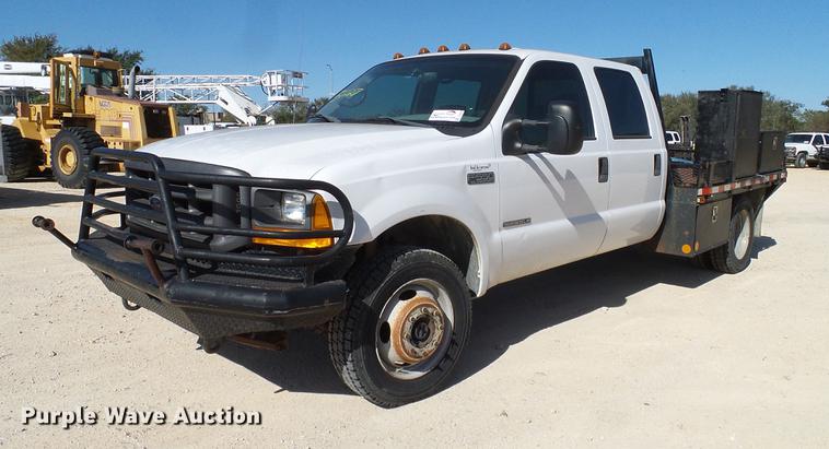 image for item DC2224 2001 Ford F550 Crew Cab flatbed truck