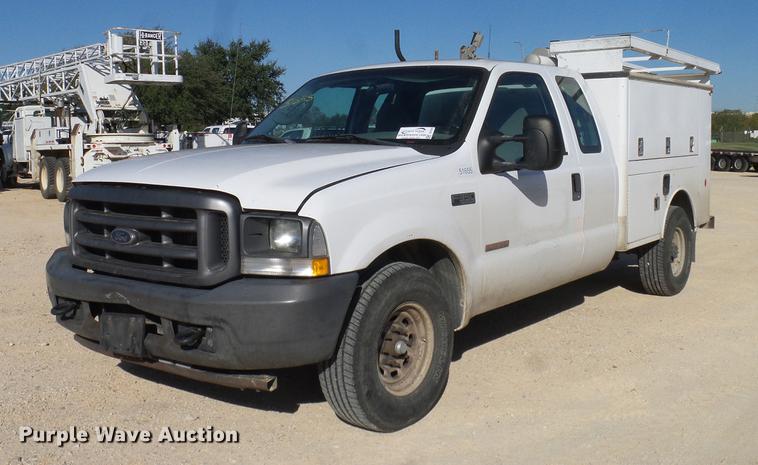 image for item DC2236 2004 Ford F350 Super Duty SuperCab utility bed pickup truck