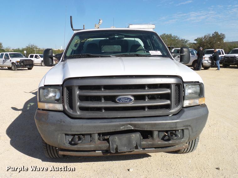 image for item DC2236 2004 Ford F350 Super Duty SuperCab utility bed pickup truck