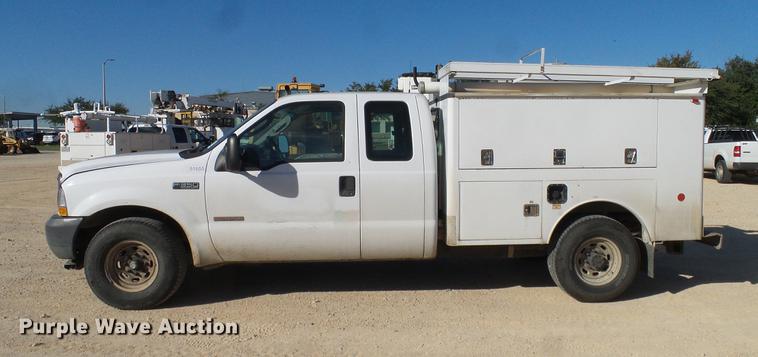 image for item DC2236 2004 Ford F350 Super Duty SuperCab utility bed pickup truck