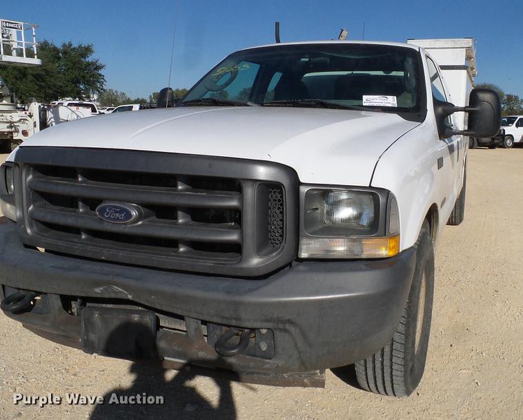 image for item DC2236 2004 Ford F350 Super Duty SuperCab utility bed pickup truck