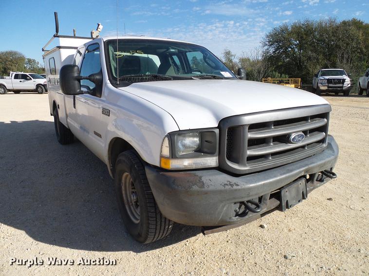 image for item DC2236 2004 Ford F350 Super Duty SuperCab utility bed pickup truck