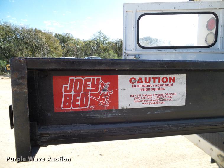 image for item DC2236 2004 Ford F350 Super Duty SuperCab utility bed pickup truck