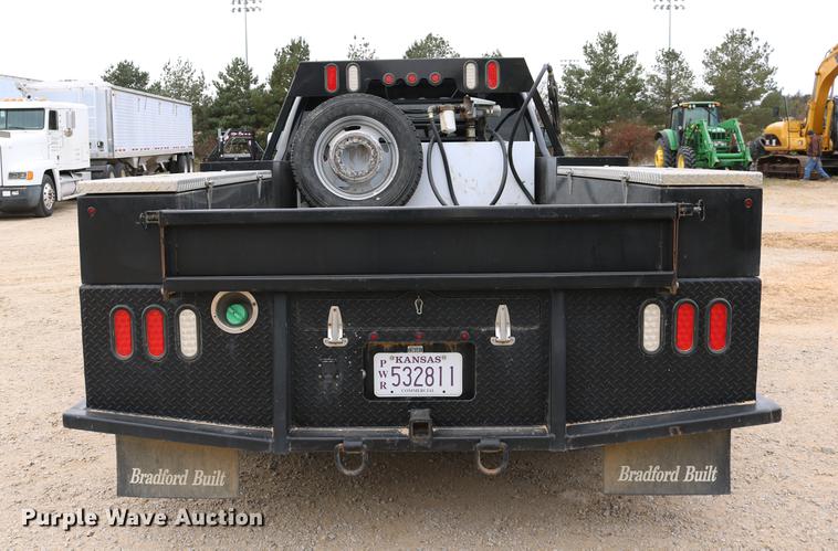 image for item DC3716 2012 Dodge Ram 5500 Crew Cab flatbed truck