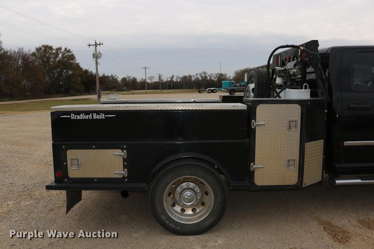 image for item DC3716 2012 Dodge Ram 5500 Crew Cab flatbed truck