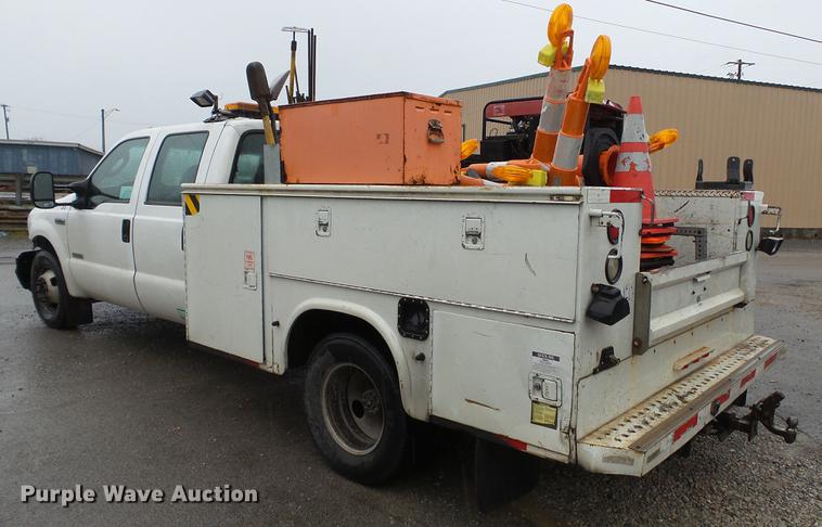 image for item DC5739 2007 Ford F350 Super Duty Crew Cab utility bed pickup truck