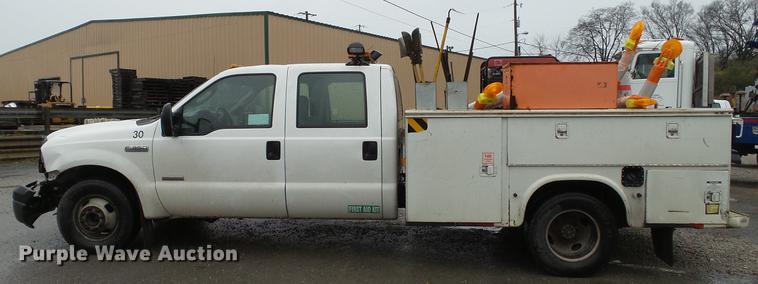 image for item DC5739 2007 Ford F350 Super Duty Crew Cab utility bed pickup truck