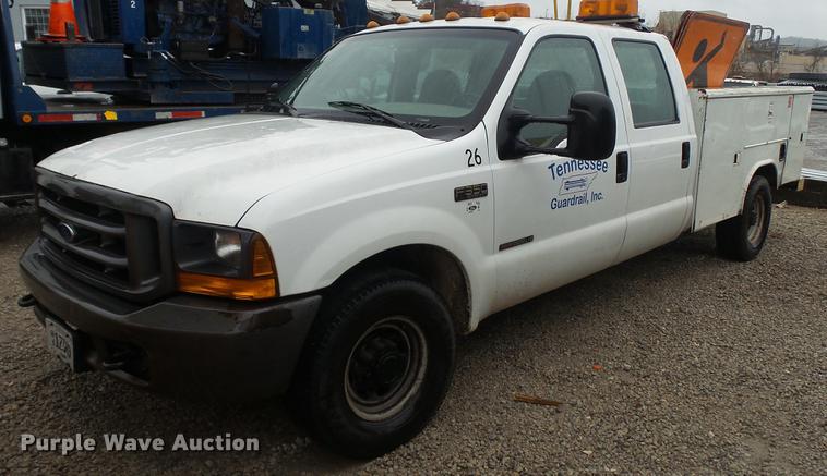 image for item DC5742 2000 Ford F350 Super Duty XL Crew Cab utility bed pickup truck