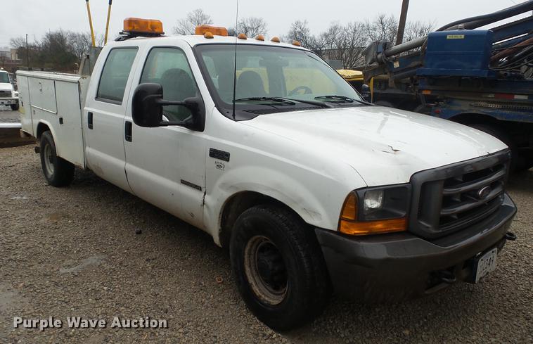 image for item DC5742 2000 Ford F350 Super Duty XL Crew Cab utility bed pickup truck