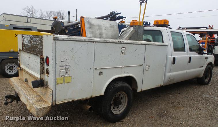 image for item DC5742 2000 Ford F350 Super Duty XL Crew Cab utility bed pickup truck