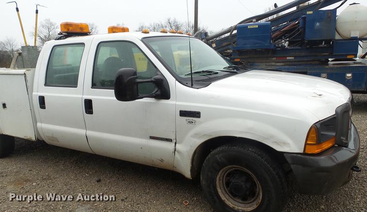 image for item DC5742 2000 Ford F350 Super Duty XL Crew Cab utility bed pickup truck