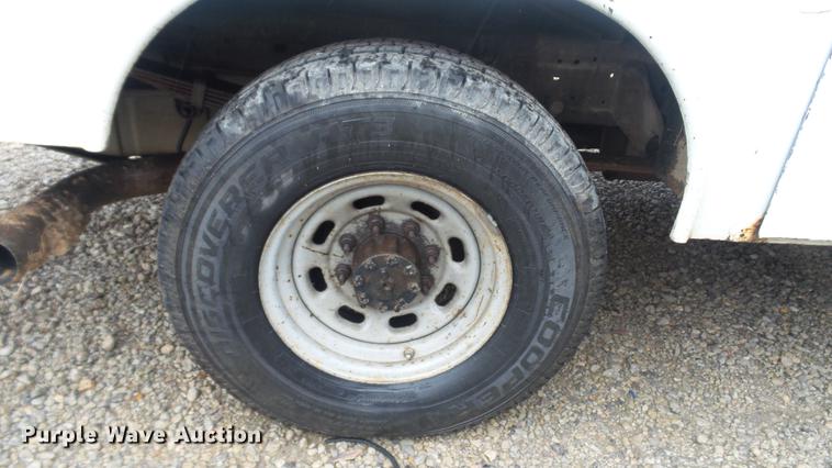 image for item DC5742 2000 Ford F350 Super Duty XL Crew Cab utility bed pickup truck