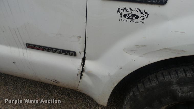 image for item DC5742 2000 Ford F350 Super Duty XL Crew Cab utility bed pickup truck