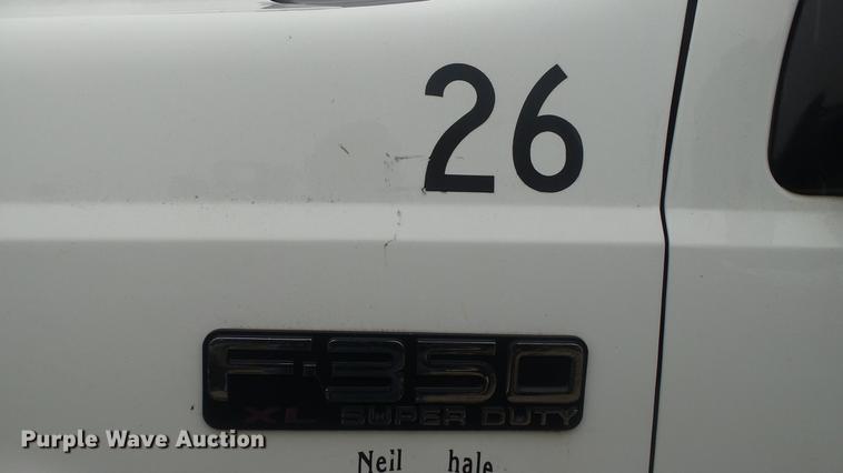 image for item DC5742 2000 Ford F350 Super Duty XL Crew Cab utility bed pickup truck