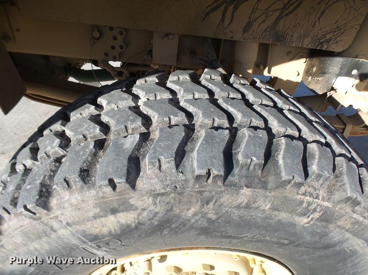 image for item DP9600 1997 Stewart Stevenson M-1078 flatbed truck