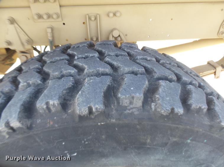 image for item DP9600 1997 Stewart Stevenson M-1078 flatbed truck