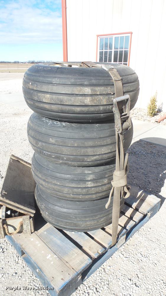 image for item DX9930 (4) Goodyear 11L-15 tires and wheels