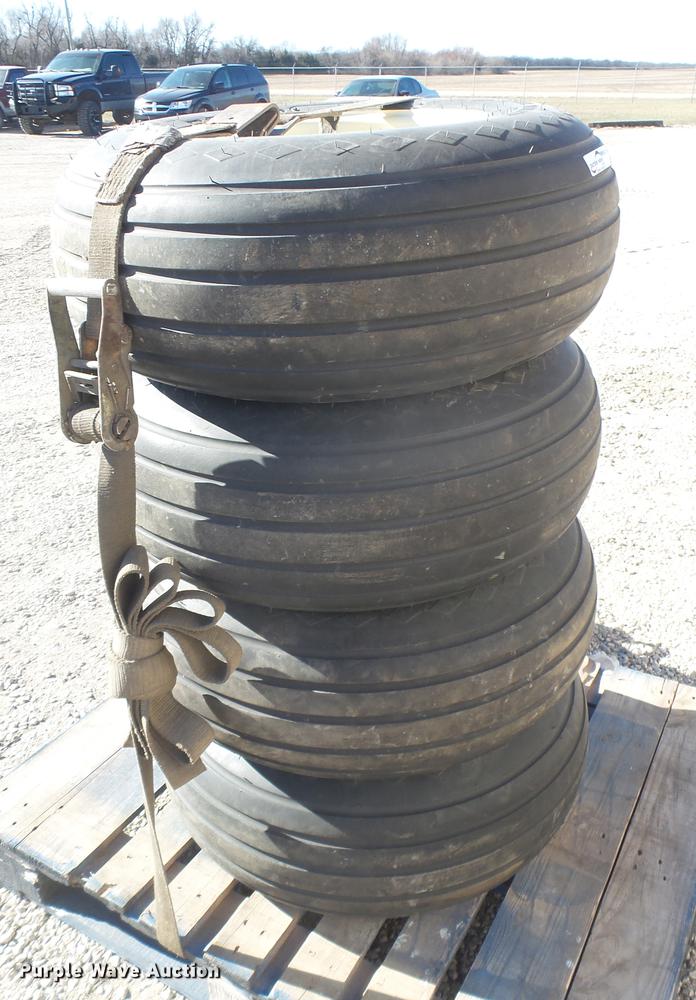 image for item DX9930 (4) Goodyear 11L-15 tires and wheels