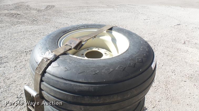 image for item DX9930 (4) Goodyear 11L-15 tires and wheels