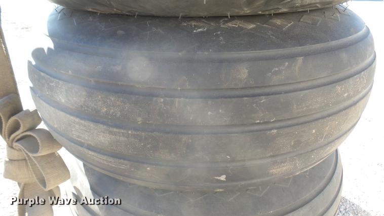 image for item DX9930 (4) Goodyear 11L-15 tires and wheels