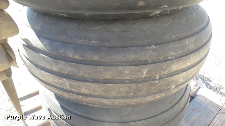 image for item DX9930 (4) Goodyear 11L-15 tires and wheels