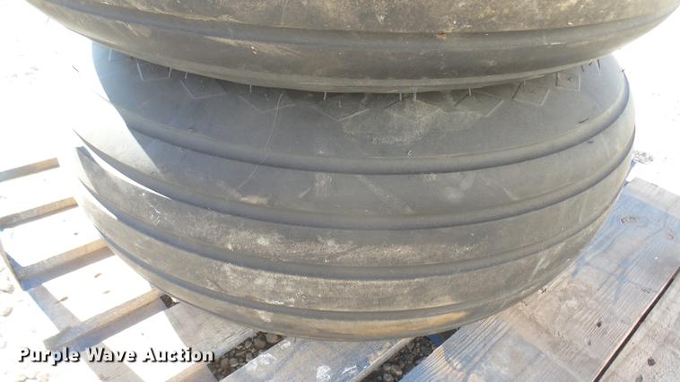 image for item DX9930 (4) Goodyear 11L-15 tires and wheels