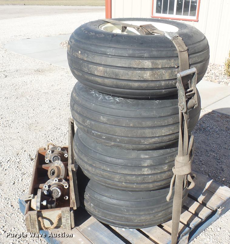 image for item DX9930 (4) Goodyear 11L-15 tires and wheels