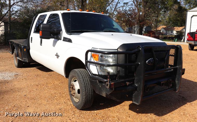 image for item EC9275 2011 Ford F350 Super Duty flatbed pickup truck