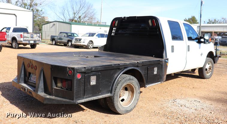 image for item EC9275 2011 Ford F350 Super Duty flatbed pickup truck
