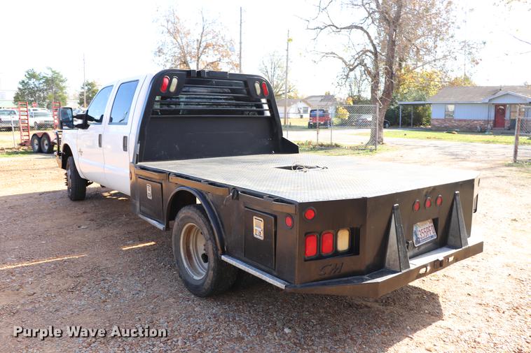 image for item EC9275 2011 Ford F350 Super Duty flatbed pickup truck