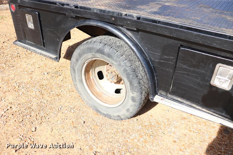 image for item EC9275 2011 Ford F350 Super Duty flatbed pickup truck