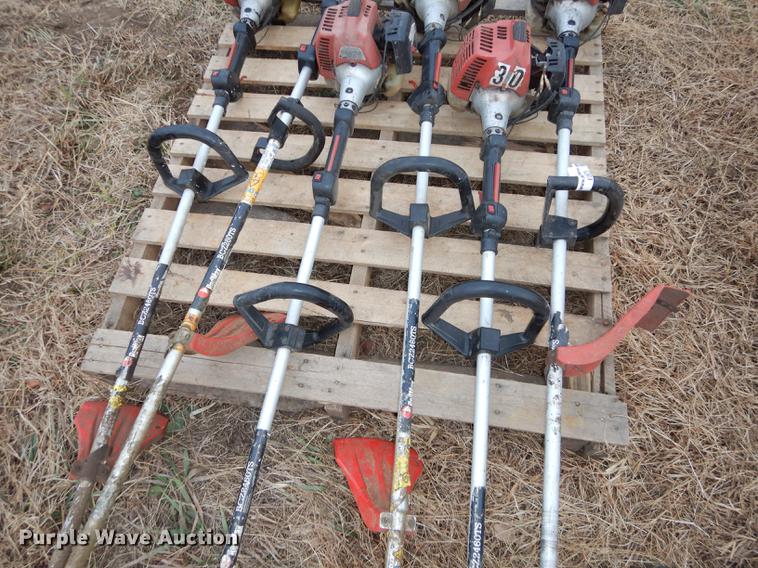 image for item EC9879 (12) Redmax string trimmers