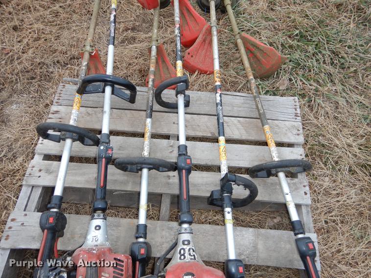 image for item EC9879 (12) Redmax string trimmers