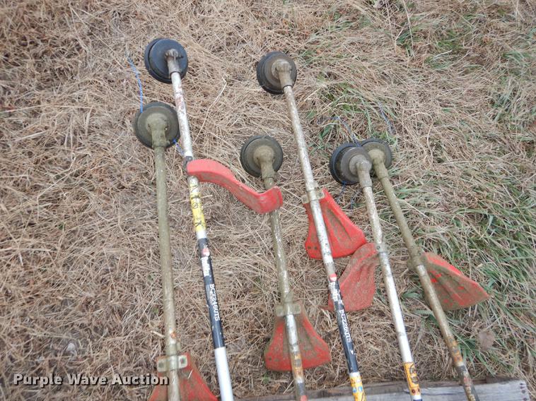 image for item EC9879 (12) Redmax string trimmers