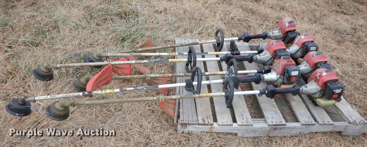 image for item EC9879 (12) Redmax string trimmers