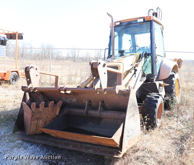 image for item ED9743 1999 New Holland 675 backhoe