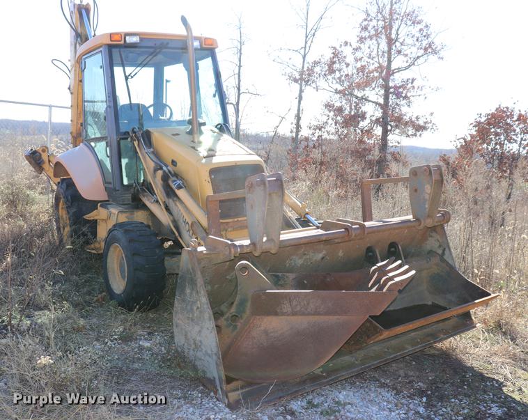 image for item ED9743 1999 New Holland 675 backhoe